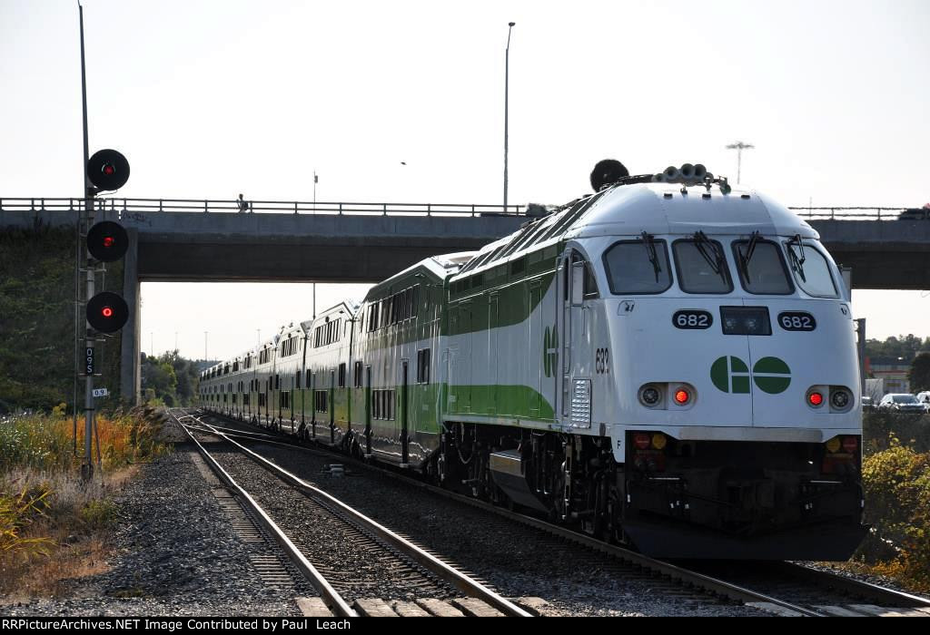 Westbound commuter shoves out of the station